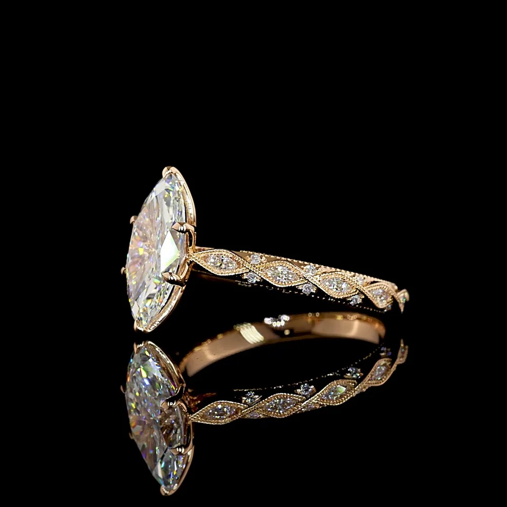 14K Rose Gold Marquise Cut Lab Diamond Twisted Shank Ring with Accent Marquise and Round Diamonds - 2.25 Carat Total Weight - Covaloro Fine Jewelry - Image 4