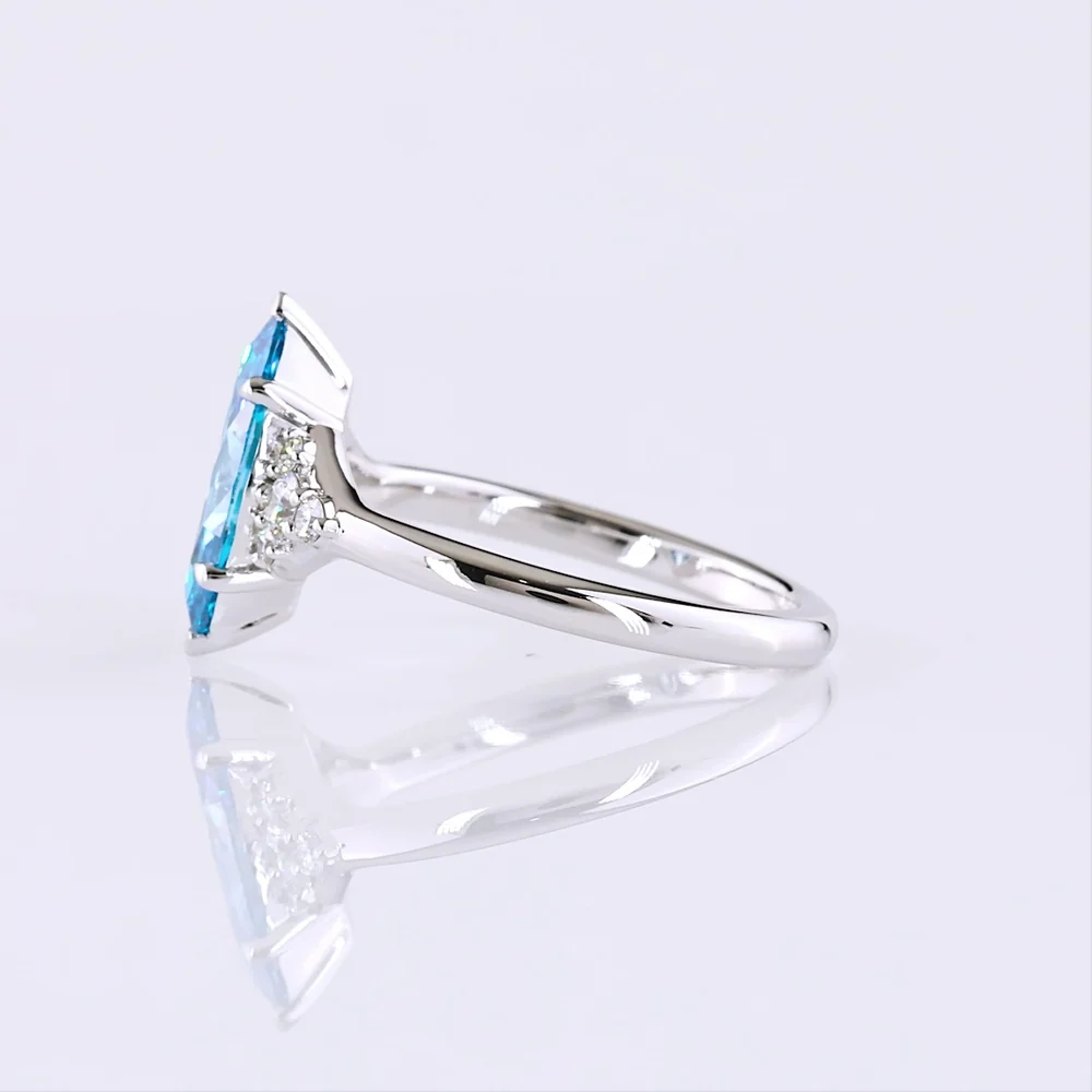 14K White Gold 1.84 Carats Total Weight Marquise Cut Fancy Vivid Blue Lab Diamond Ring with Brilliant Cut Diamond Accents - IGI Certified - Covaloro Fine Jewelry - Image 3
