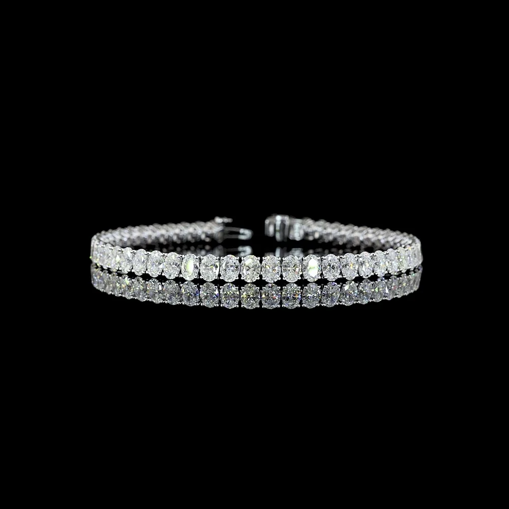 14K White Gold 7.5" Tennis Bracelet with 49 Prong-Set Oval Lab Grown Diamonds - 10.47 Carat Total Diamond Weight, D VS1 Clarity - Covaloro Fine Jewelry