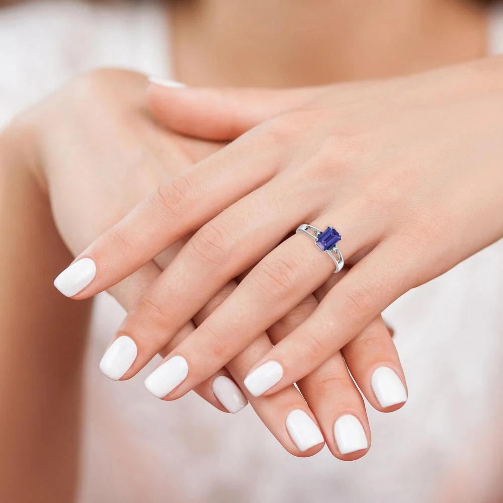 14K White Gold 7x5mm Emerald Cut Tanzanite AA Diamond Ring - 1.15 Carat Tanzanite, 0.02 Carat Diamonds - Size 6 by Monteluci Fine Jewelry - Image 3