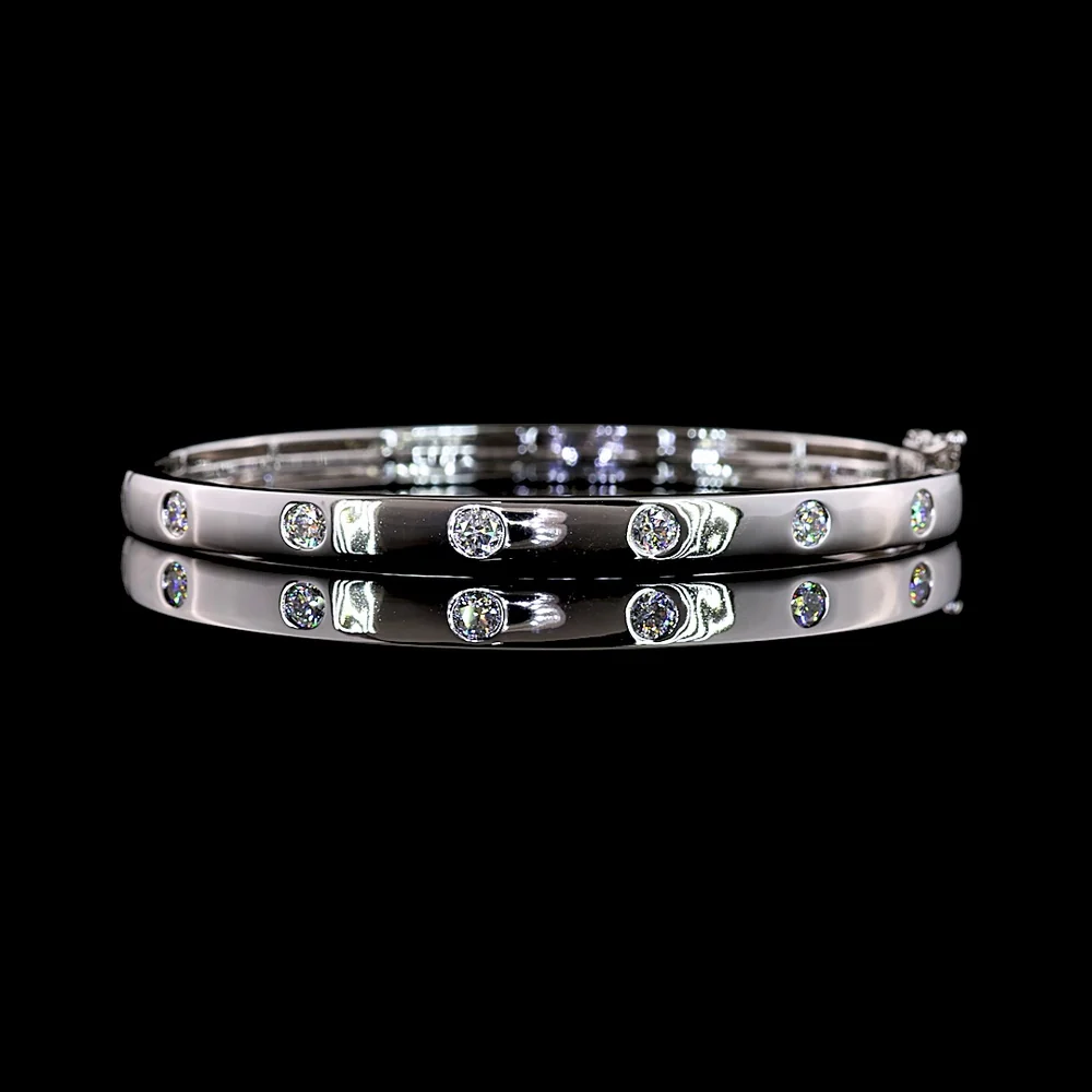 14K White Gold Flush-Set Lab Diamond Bangle with 7 Round Brilliant Cut Stones - 0.79 Carat Total Diamond Weight, E-F Color, VS1 Clarity - Covaloro Fine Jewelry