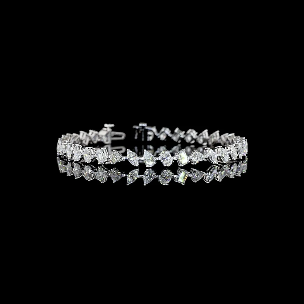 14K White Gold Mixed Shape Station Bracelet with Inclined Prong-Set Emerald, Oval, Pear, and Heart Lab Diamonds - 7.51 Carats Total Diamond Weight - Covaloro Fine Jewelry
