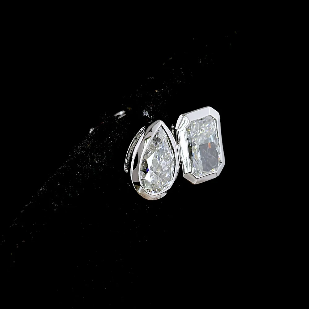 14K White Gold Mixed Shape Stud Earrings with Bezel Set Radiant and Pear Lab Diamonds - 1.72 Carat Total Weight - Covaloro Fine Jewelry - Image 4