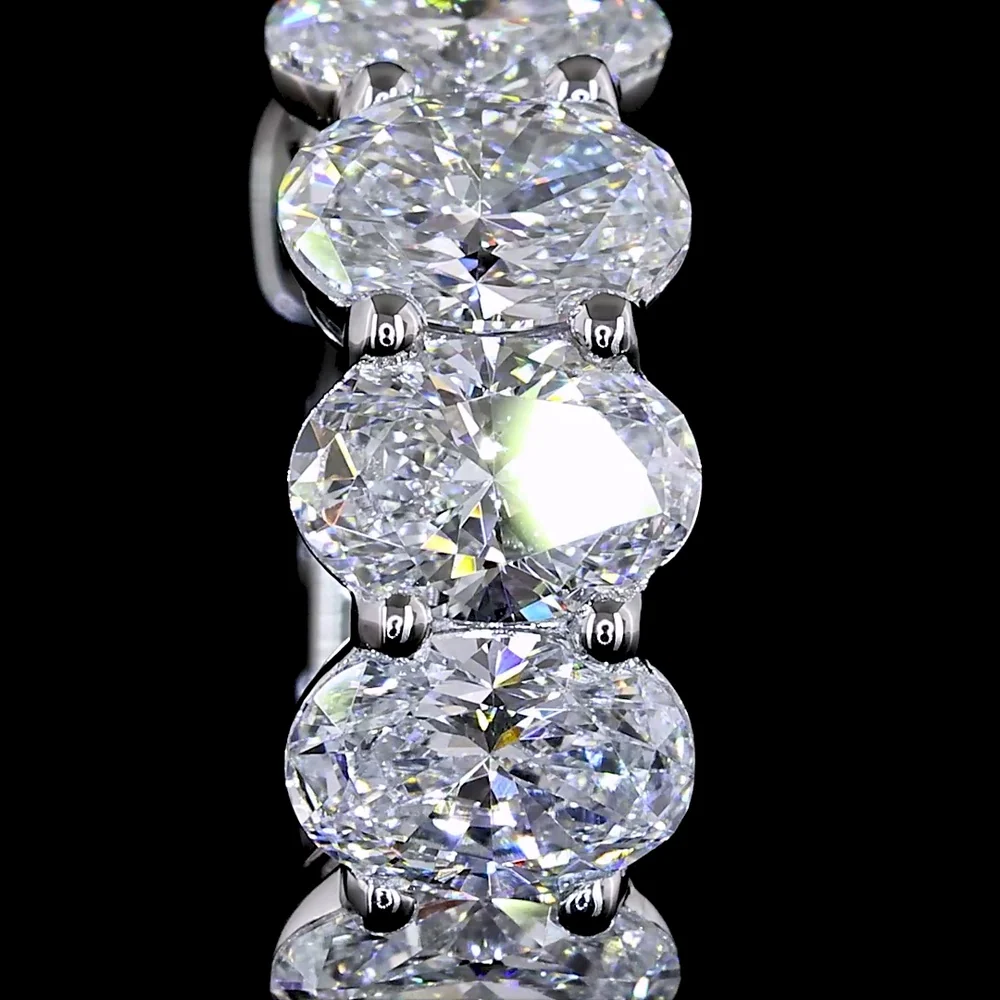 14K White Gold Oval Cut Lab Diamond Huggie Earrings with Secure Hinged Backs - 2.05 Carats Total Diamond Weight, E-F VS Clarity - Covaloro Fine Jewelry - Image 3