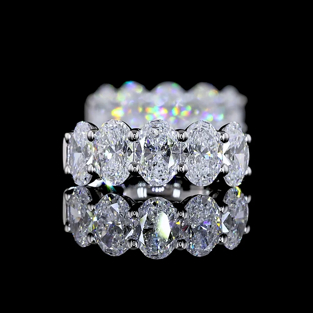 14K White Gold Oval Lab Diamond Huggie Earrings with Shared Prong Setting - 2.08 Carat Total Weight, E-F Color, VS1 Clarity - Covaloro Fine Jewelry - Image 4