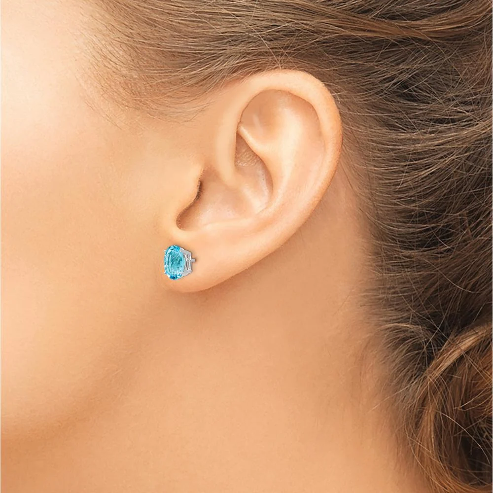 14K White Gold Oval Swiss Blue Topaz Stud Earrings - 1.35 Carat Total Carat Weight by Monteluci Fine Jewelry - Image 3