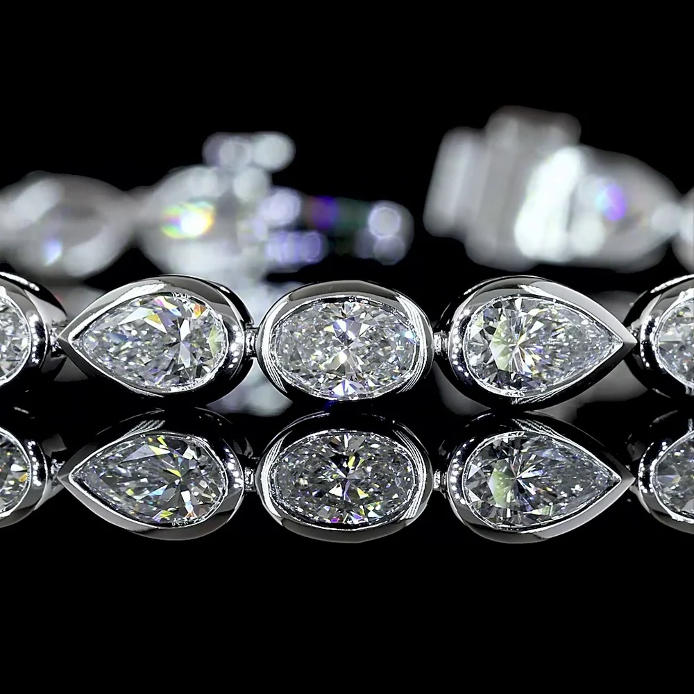 14K White Gold Tennis Bracelet with Alternating Oval and Pear Shaped Bezel-Set Lab Diamonds - 6.32 Carats Total Diamond Weight - Covaloro Fine Jewelry - Image 2