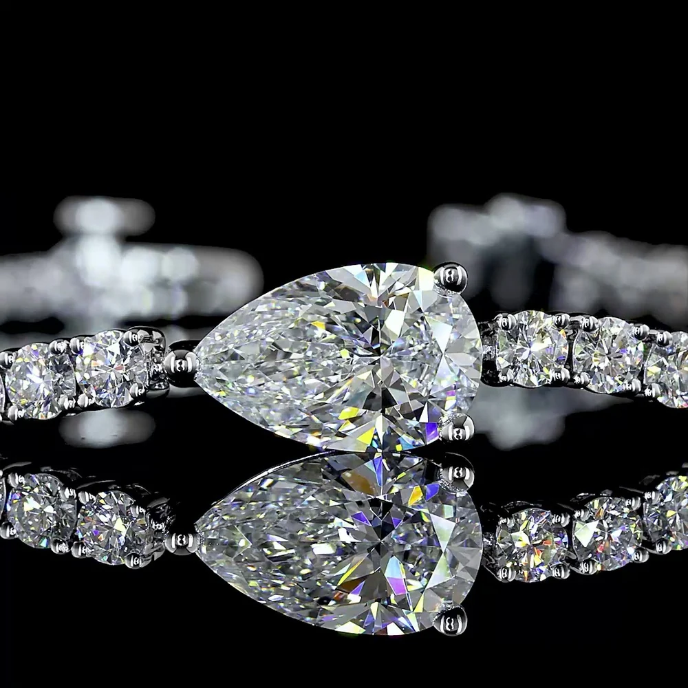 14K White Gold Tennis Bracelet with East-West Pear Shape Lab Diamond and 64 Round Brilliant Cut Lab Diamonds - 4.52 Carat Total Weight - Covaloro Fine Jewelry - Image 2