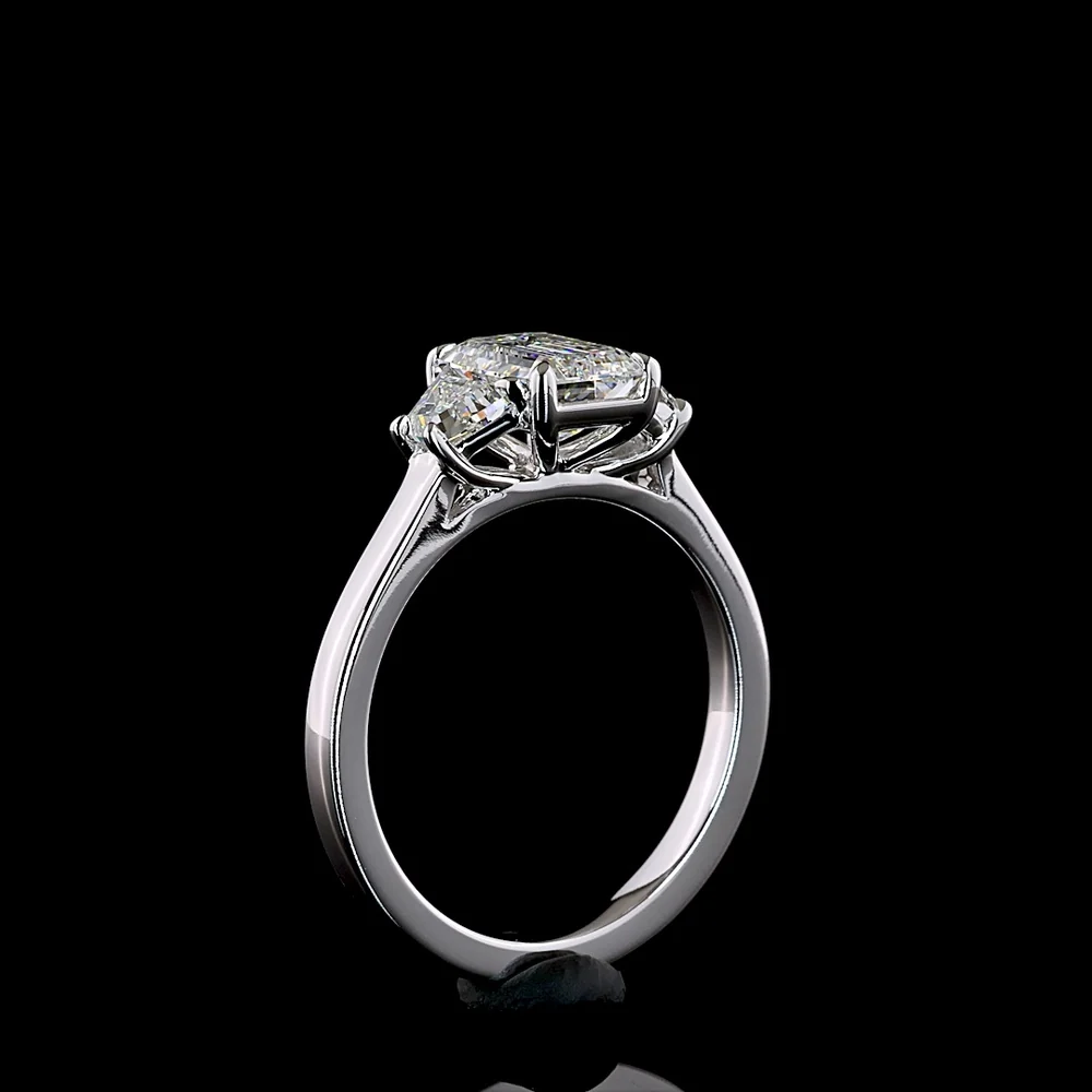 14K White Gold Three Stone Ring with 1.27 Carat Emerald Cut Lab Diamond and 0.50 Carat Trapezoid Side Stones - 1.77 Carat Total Diamond Weight D VVS1 IGI Certified - Covaloro Fine Jewelry - Image 4