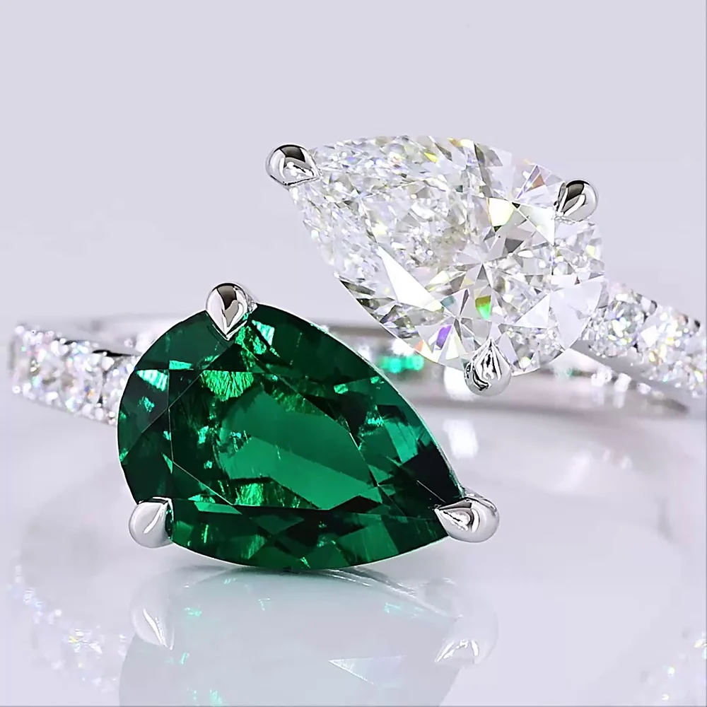14K White Gold Toi et Moi Ring with Pear Shape Lab Emerald and E VS1 Lab Diamond - 1.60 Carats Total Gem Weight with 0.50 Carats Accent Diamonds - Covaloro Fine Jewelry - Image 2