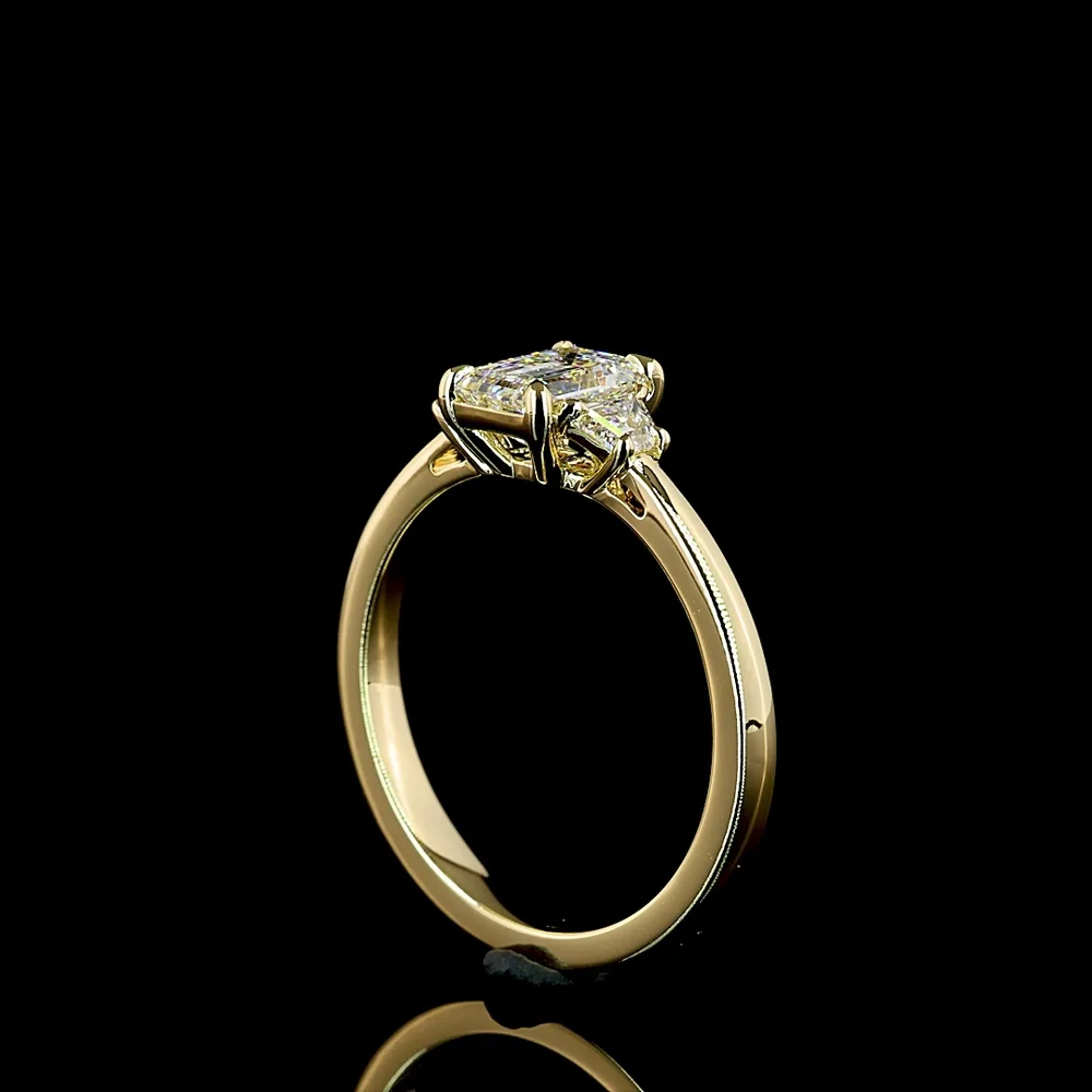 14K Yellow Gold 3-Stone Emerald Cut Lab Diamond Ring with Trapezoid Side Stones - 1.26 Carat Total Weight (E VVS2 Center) - Covaloro Fine Jewelry - Image 3