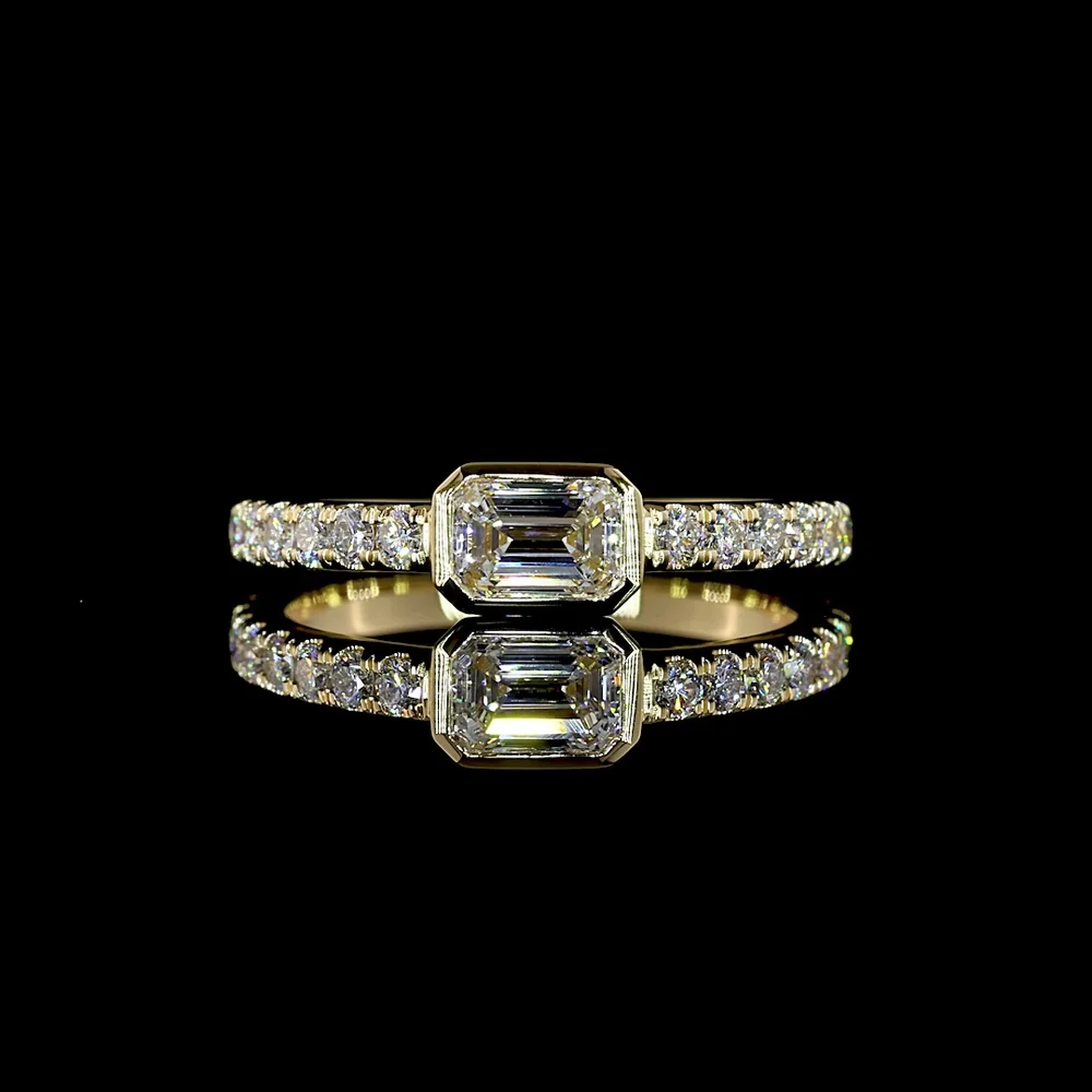 14K Yellow Gold East-West Emerald Cut Lab Diamond Ring with Bezel and Prong Set Accents - 0.76 Carat Total Weight - Covaloro Fine Jewelry